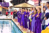 Lemoore's water polo teams stood for the National Anthem during Thursday's match in Lemoore. The Tigers won the match to set up a key game with Redwood on Thursday.
